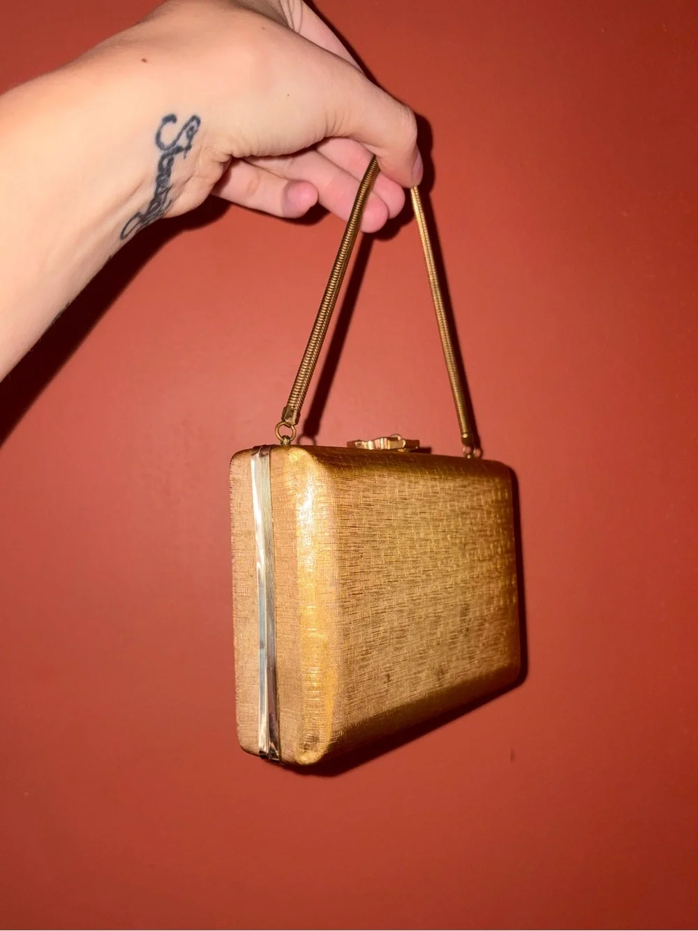 Antique Volupté gold handbag